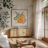 Pumpkins and Eucalyptus II by Chris Paschke. Shown in a natural wood frame in a cozy modern living room. Available as an archival giclee rolled canvas, fine art paper, or poster print. SKU 81865a.