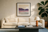 Purple Rock Dawn II by Chris Paschke. Displayed in a glass frame with matte in a clean modern living room. Available as an archival giclee rolled canvas, fine art paper, or poster print. SKU 24083a.