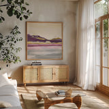 Purple Rock Dawn II Gold by Chris Paschke. Shown in a natural wood frame in a cozy modern living room. Available as an archival giclee rolled canvas, fine art paper, or poster print. SKU 24295a.