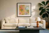 Rainbow Cosmos I by Chris Paschke. Displayed in a glass frame with matte in a clean modern living room. Available as an archival giclee rolled canvas, fine art paper, or poster print. SKU 24353a.