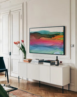 Rainbowscape I Crop by Chris Paschke. shown as a framed stretched canvas in a living room above a console. Available as a archival giclee rolled canvas, fine art paper, or poster print. SKU 81890i.
