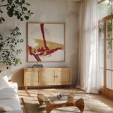 Red Gold IV by Chris Paschke. Shown in a natural wood frame in a cozy modern living room. Available as an archival giclee rolled canvas, fine art paper, or poster print. SKU 55983a.