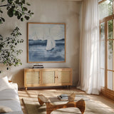 Sailboats VI by Chris Paschke. Shown in a natural wood frame in a cozy modern living room. Available as an archival giclee rolled canvas, fine art paper, or poster print. SKU 73879a.