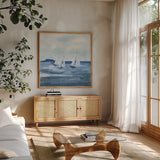 Sailboats VIII by Chris Paschke. Shown in a natural wood frame in a cozy modern living room. Available as an archival giclee rolled canvas, fine art paper, or poster print. SKU 73881a.