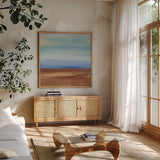 Sandy Ridge I by Chris Paschke. Shown in a natural wood frame in a cozy modern living room. Available as an archival giclee rolled canvas, fine art paper, or poster print. SKU 65477a.