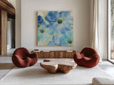 Seashell Cosmos I by Chris Paschke. Shown as extra-large giant wall art in a modern living room. Available as an archival giclee rolled canvas, fine art paper, or poster print. SKU 24333a.