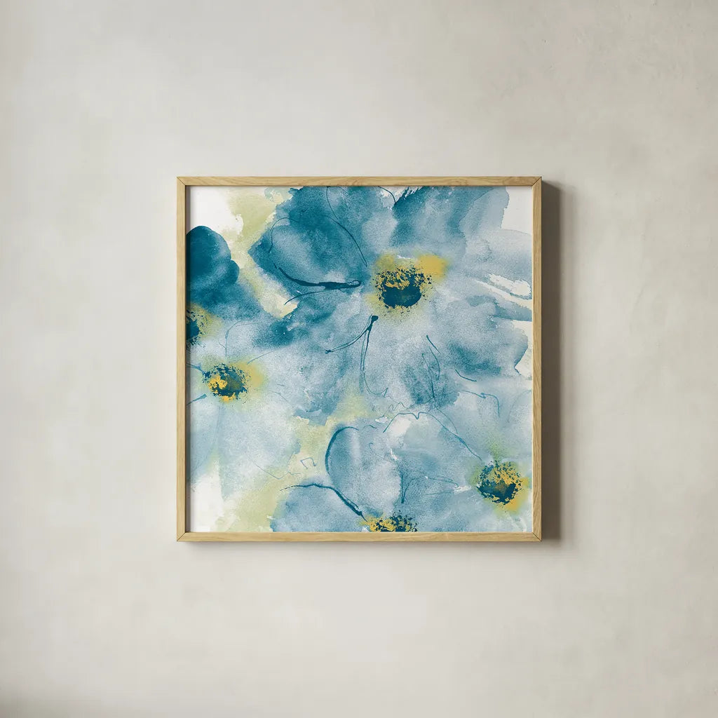 Seashell Cosmos I Blue and Yellow by Chris Paschke. Shown in a natural wood glass frame for a timeless modern aesthetic. Available as an archival giclee rolled canvas, fine art paper, or poster print. SKU 31295a.
