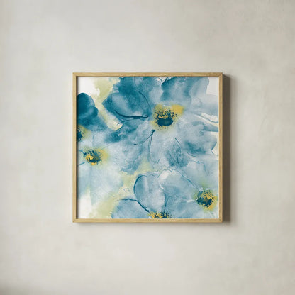 Seashell Cosmos I Blue and Yellow by Chris Paschke. Shown in a natural wood glass frame for a timeless modern aesthetic. Available as an archival giclee rolled canvas, fine art paper, or poster print. SKU 31295a.