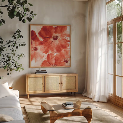 Seashell Cosmos I Red and Orange by Chris Paschke. Shown in a natural wood frame in a cozy modern living room. Available as an archival giclee rolled canvas, fine art paper, or poster print. SKU 31299a.