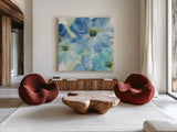 Seashell Cosmos I White by Chris Paschke. Shown as extra-large giant wall art in a modern living room. Available as an archival giclee rolled canvas, fine art paper, or poster print. SKU 31297a.