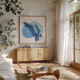 Serenity Mirage II by Chris Paschke. Shown in a natural wood frame in a cozy modern living room. Available as an archival giclee rolled canvas, fine art paper, or poster print. SKU 85754a.