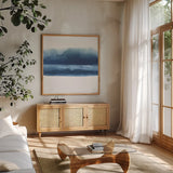 Serenity Sea VI by Chris Paschke. Shown in a natural wood frame in a cozy modern living room. Available as an archival giclee rolled canvas, fine art paper, or poster print. SKU 85760a.