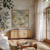 Silver Quince II by Chris Paschke. Shown in a natural wood frame in a cozy modern living room. Available as an archival giclee rolled canvas, fine art paper, or poster print. SKU 24356a.
