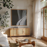 Soft White I by Chris Paschke. Shown in a natural wood frame in a cozy modern living room. Available as an archival giclee rolled canvas, fine art paper, or poster print. SKU 84563a.