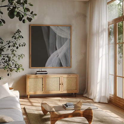 Soft White III by Chris Paschke. Shown in a natural wood frame in a cozy modern living room. Available as an archival giclee rolled canvas, fine art paper, or poster print. SKU 84565a.