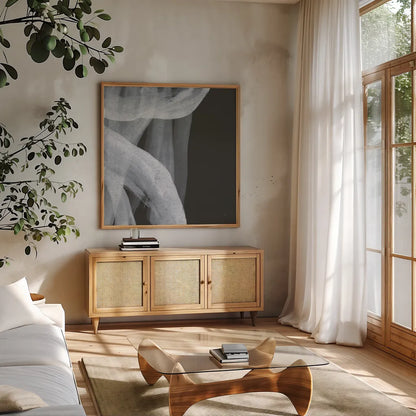 Soft White IV by Chris Paschke. Shown in a natural wood frame in a cozy modern living room. Available as an archival giclee rolled canvas, fine art paper, or poster print. SKU 84566a.