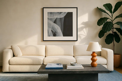 Soft White IV by Chris Paschke. Displayed in a glass frame with matte in a clean modern living room. Available as an archival giclee rolled canvas, fine art paper, or poster print. SKU 84566a.