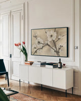 Spring Blossoms III by Chris Paschke. shown as a framed stretched canvas in a living room above a console. Available as a archival giclee rolled canvas, fine art paper, or poster print. SKU 25207i.