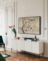 Spring Blossoms IV by Chris Paschke. shown as a framed stretched canvas in a living room above a console. Available as a archival giclee rolled canvas, fine art paper, or poster print. SKU 25208i.