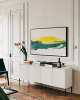 Sunrise by Chris Paschke. shown as a framed stretched canvas in a living room above a console. Available as a archival giclee rolled canvas, fine art paper, or poster print. SKU 65430i.