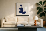 Swash IV Indigo by Chris Paschke. Displayed in a glass frame with matte in a clean modern living room. Available as an archival giclee rolled canvas, fine art paper, or poster print. SKU 68775a.