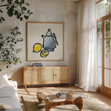 Tea and Lemons Navy by Chris Paschke. Shown in a natural wood frame in a cozy modern living room. Available as an archival giclee rolled canvas, fine art paper, or poster print. SKU 46147a.