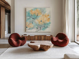 Teal Buds I by Chris Paschke. Shown as extra-large giant wall art in a modern living room. Available as an archival giclee rolled canvas, fine art paper, or poster print. SKU 45472a.