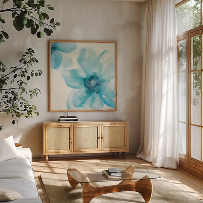 Teal Cosmos I by Chris Paschke. Shown in a natural wood frame in a cozy modern living room. Available as an archival giclee rolled canvas, fine art paper, or poster print. SKU 34004a.