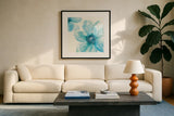 Teal Cosmos I by Chris Paschke. Displayed in a glass frame with matte in a clean modern living room. Available as an archival giclee rolled canvas, fine art paper, or poster print. SKU 34004a.