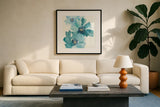 Teal Cosmos IV by Chris Paschke. Displayed in a glass frame with matte in a clean modern living room. Available as an archival giclee rolled canvas, fine art paper, or poster print. SKU 34007a.