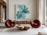 Teal Cosmos IV by Chris Paschke. Shown as extra-large giant wall art in a modern living room. Available as an archival giclee rolled canvas, fine art paper, or poster print. SKU 34007a.