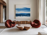 Teal and Navy I by Chris Paschke. Shown as extra-large giant wall art in a modern living room. Available as an archival giclee rolled canvas, fine art paper, or poster print. SKU 81049a.