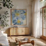 Tinted Clematis I by Chris Paschke. Shown in a natural wood frame in a cozy modern living room. Available as an archival giclee rolled canvas, fine art paper, or poster print. SKU 47269a.