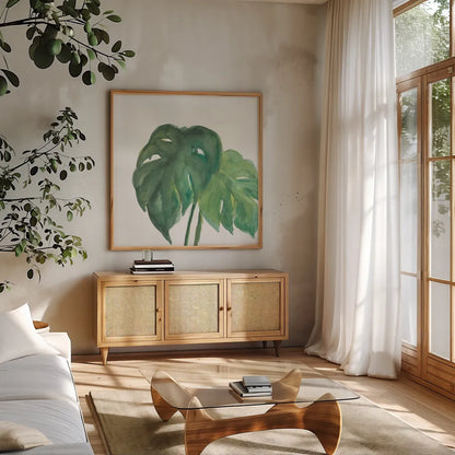 Tropical Palm II by Chris Paschke. Shown in a natural wood frame in a cozy modern living room. Available as an archival giclee rolled canvas, fine art paper, or poster print. SKU 22674a.