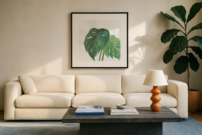 Tropical Palm II by Chris Paschke. Displayed in a glass frame with matte in a clean modern living room. Available as an archival giclee rolled canvas, fine art paper, or poster print. SKU 22674a.