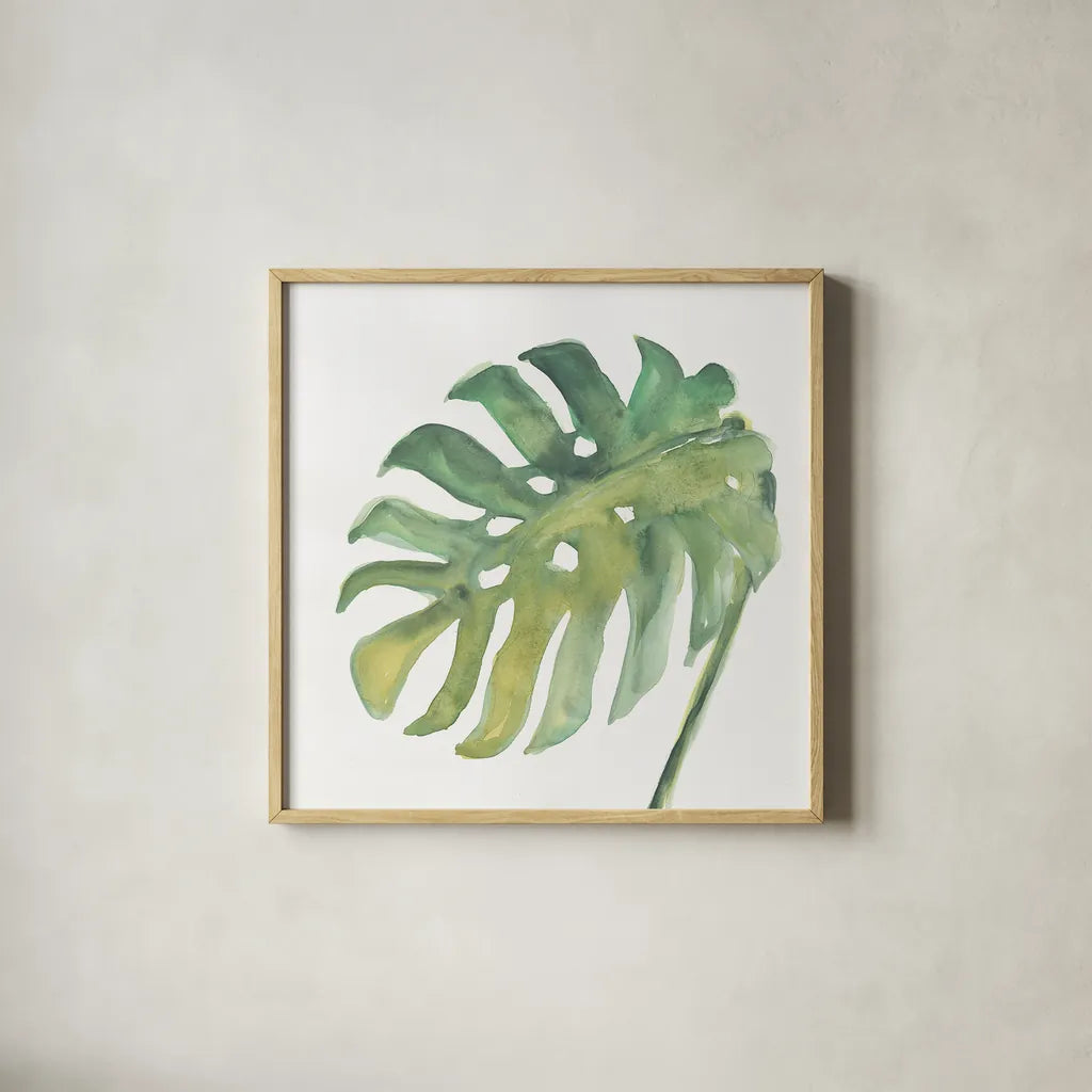 Tropical Palm IV by Chris Paschke. Shown in a natural wood glass frame for a timeless modern aesthetic. Available as an archival giclee rolled canvas, fine art paper, or poster print. SKU 22676a.