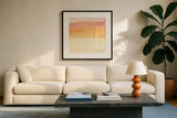 Turmeric and Sand I by Chris Paschke. Displayed in a glass frame with matte in a clean modern living room. Available as an archival giclee rolled canvas, fine art paper, or poster print. SKU 68153a.