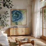 Wannabe Poppies III by Chris Paschke. Shown in a natural wood frame in a cozy modern living room. Available as an archival giclee rolled canvas, fine art paper, or poster print. SKU 34717a.
