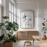Wash Poppy I by Chris Paschke. shown as a print in a natural wood frame in a dining room. Available as a archival giclee rolled canvas, fine art paper, or poster print. SKU 65448h.