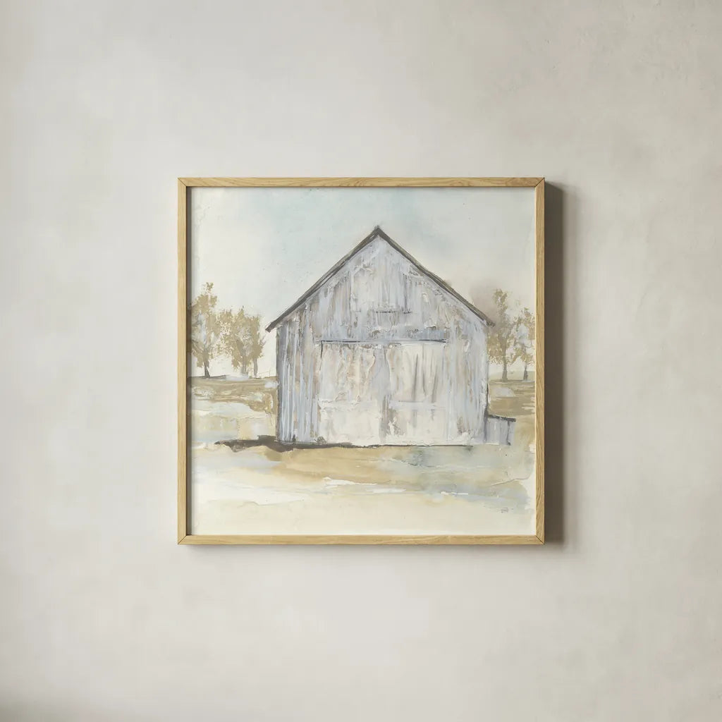 White Barn I by Chris Paschke. Shown in a natural wood glass frame for a timeless modern aesthetic. Available as an archival giclee rolled canvas, fine art paper, or poster print. SKU 62506a.