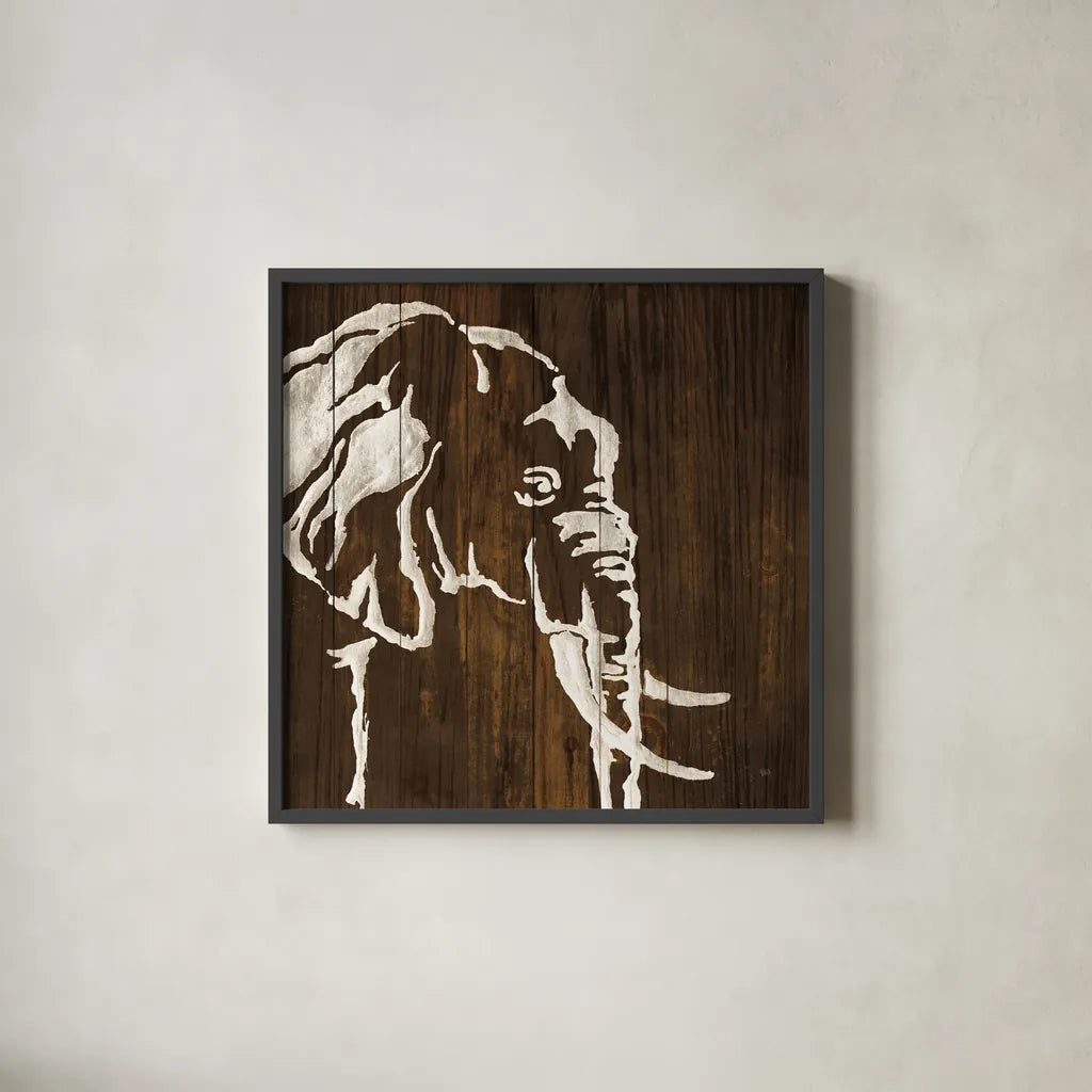 White Elephant on Dark Wood by Chris Paschke. Shown in a sleek black glass frame for a contemporary gallery look. Available as an archival giclee rolled canvas, fine art paper, or poster print. SKU 50036a.