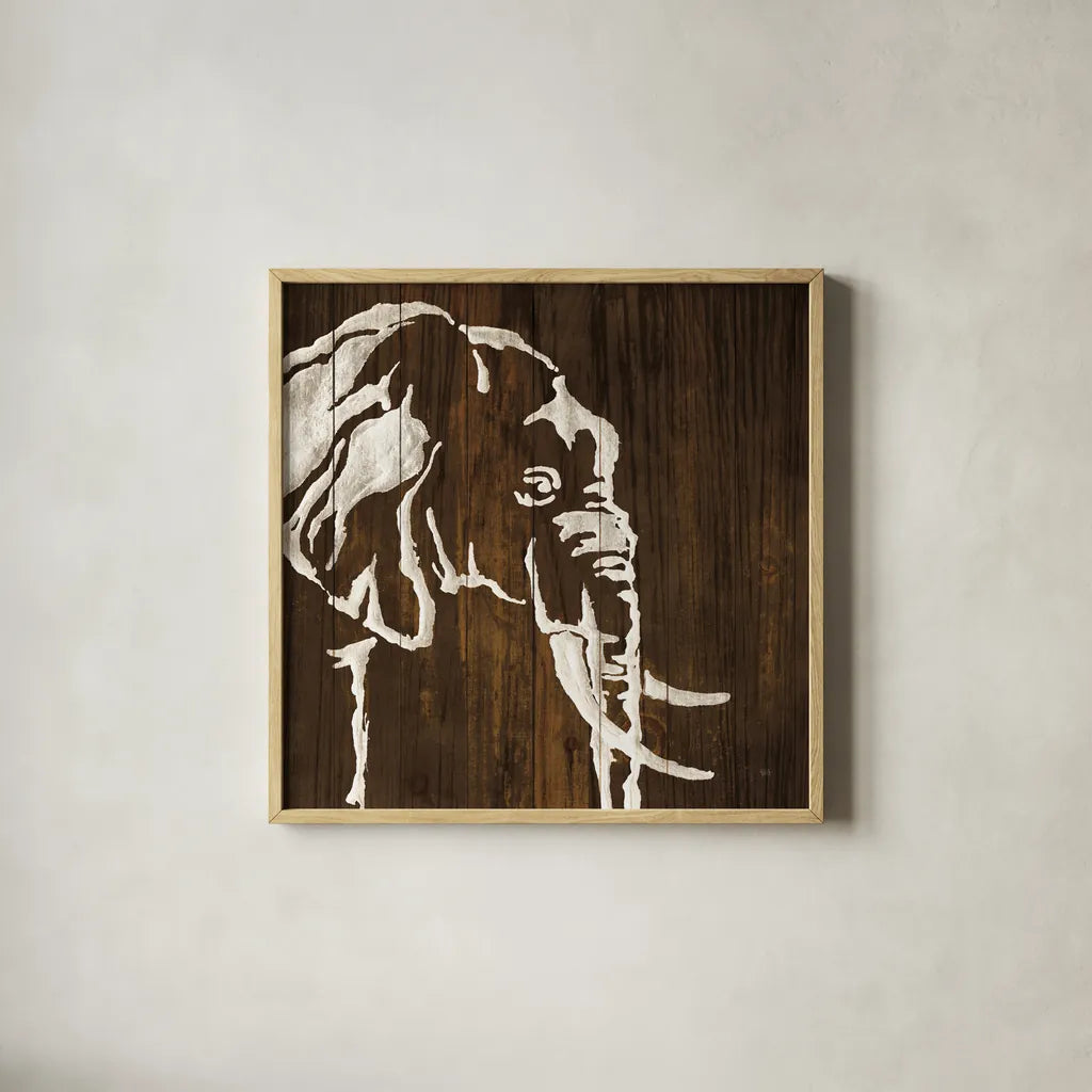 White Elephant on Dark Wood by Chris Paschke. Shown in a natural wood glass frame for a timeless modern aesthetic. Available as an archival giclee rolled canvas, fine art paper, or poster print. SKU 50036a.
