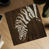 White Zebra on Dark Wood by Chris Paschke. Shown as a detailed flat fine art print, highlighting archival giclee quality. Available as an archival giclee rolled canvas, fine art paper, or poster print. SKU 50039a.