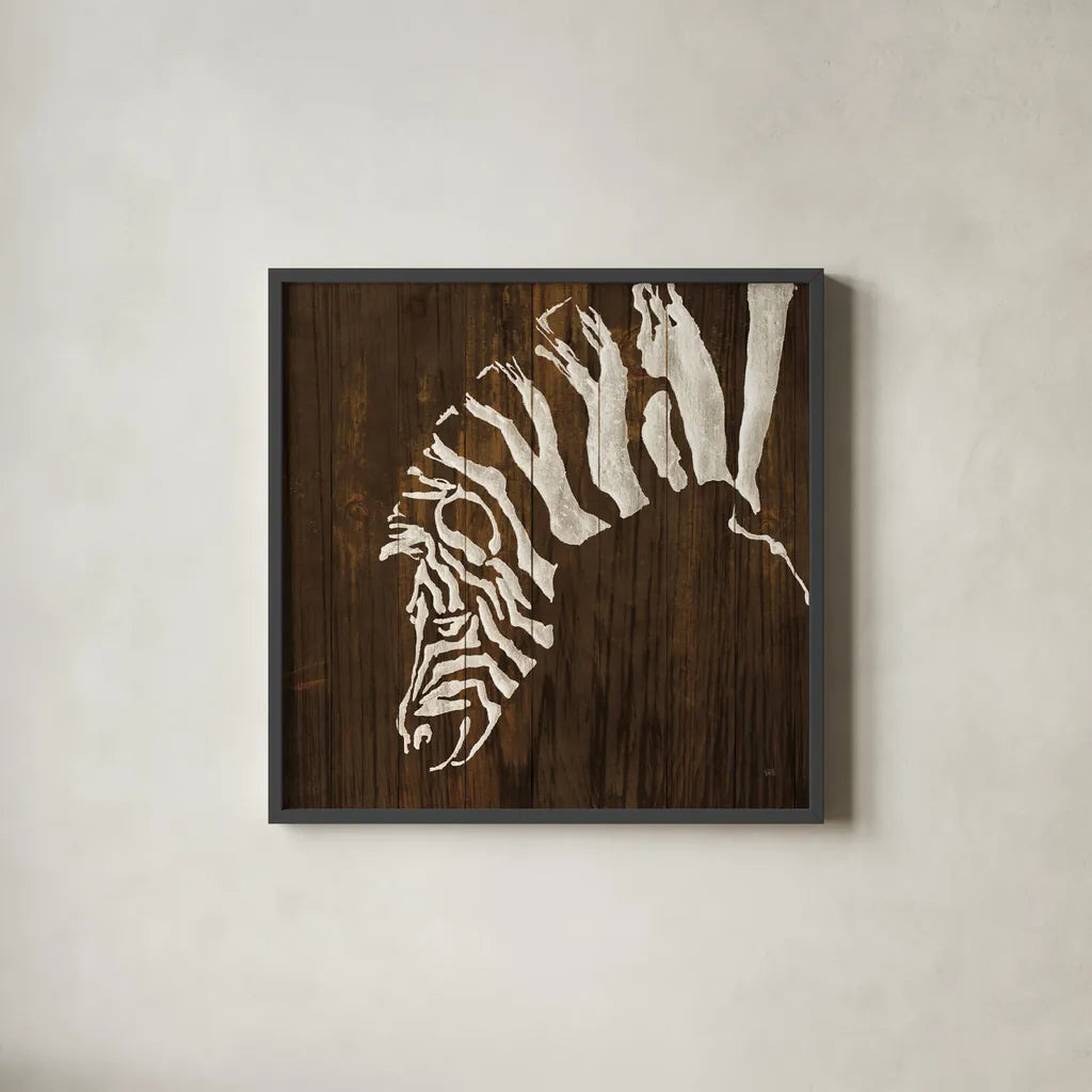 White Zebra on Dark Wood by Chris Paschke. Shown in a sleek black glass frame for a contemporary gallery look. Available as an archival giclee rolled canvas, fine art paper, or poster print. SKU 50039a.