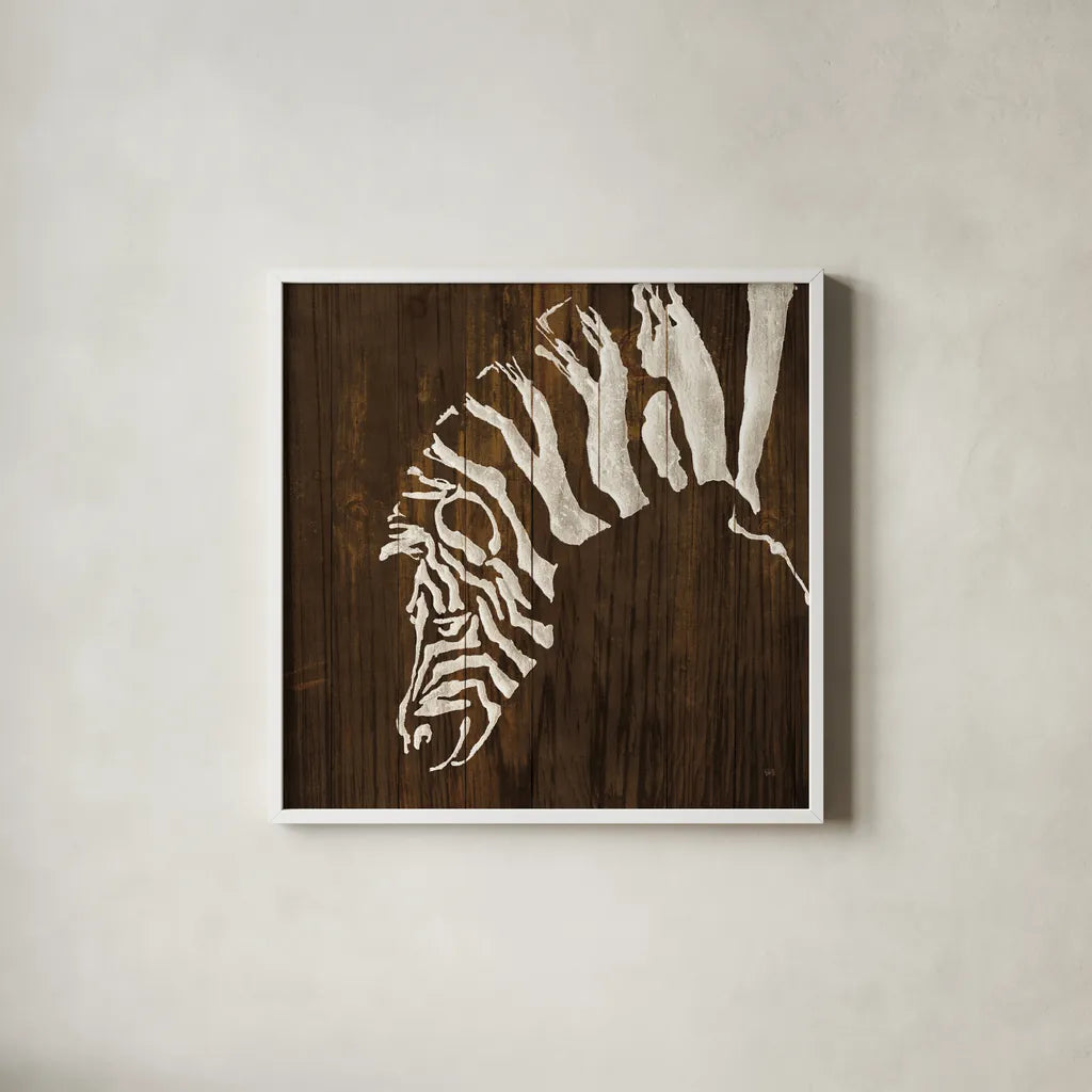White Zebra on Dark Wood by Chris Paschke. Shown in a crisp white glass frame for a clean and minimalist style. Available as an archival giclee rolled canvas, fine art paper, or poster print. SKU 50039a.