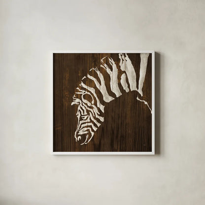White Zebra on Dark Wood by Chris Paschke. Shown in a crisp white glass frame for a clean and minimalist style. Available as an archival giclee rolled canvas, fine art paper, or poster print. SKU 50039a.