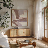 White and Placid II Blush by Chris Paschke. Shown in a natural wood frame in a cozy modern living room. Available as an archival giclee rolled canvas, fine art paper, or poster print. SKU 42720a.
