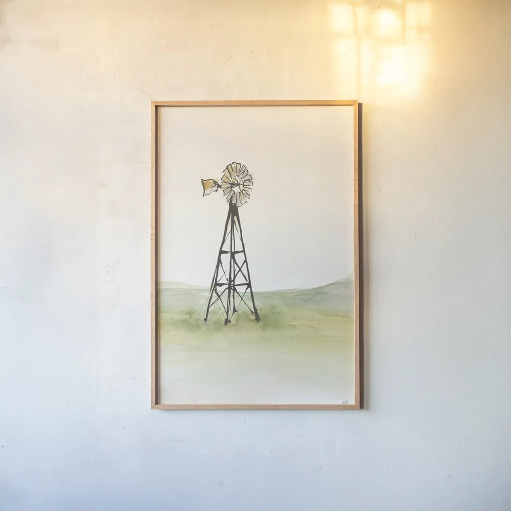 Windmill Landscape I by Chris Paschke. shown as a paper print in a natural frame. Available as a archival giclee rolled canvas, fine art paper, or poster print. SKU 76898h.