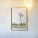 Windmill Landscape II by Chris Paschke. shown as a paper print in a natural frame. Available as a archival giclee rolled canvas, fine art paper, or poster print. SKU 76899h.