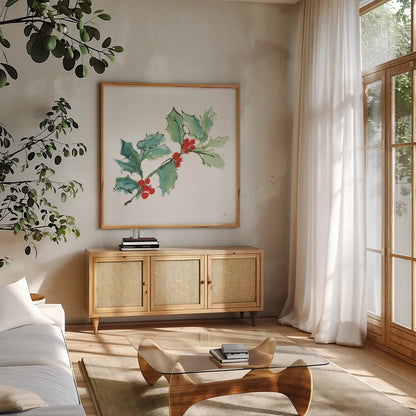 Winter Green Holly I by Chris Paschke. Shown in a natural wood frame in a cozy modern living room. Available as an archival giclee rolled canvas, fine art paper, or poster print. SKU 83116a.